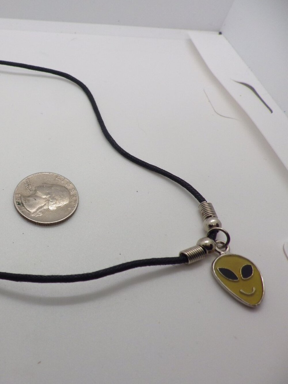 Alien Silver tone on Black Cord Necklace